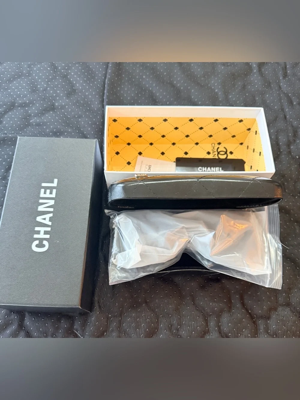 CHANEL Black-on-Black Interlocking CC Sunglasses New in Original packaging.